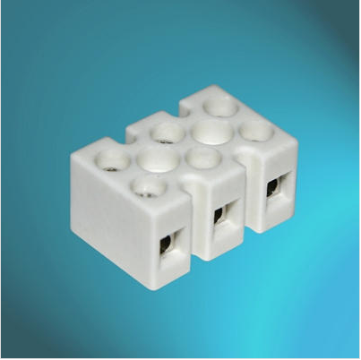 What are the conventional production materials and characteristics of terminal blocks?